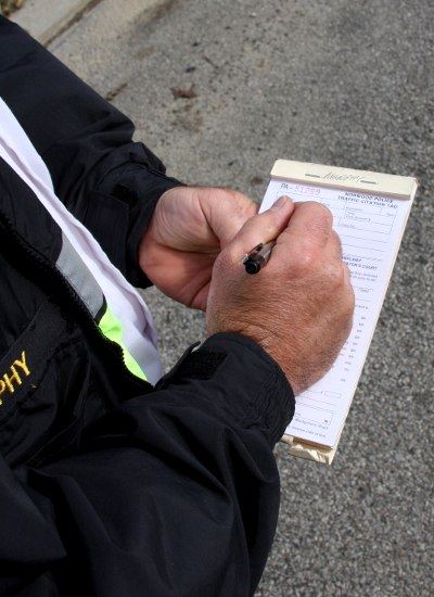 Picture of Police Office Writing a Police Ticket (JPEG)